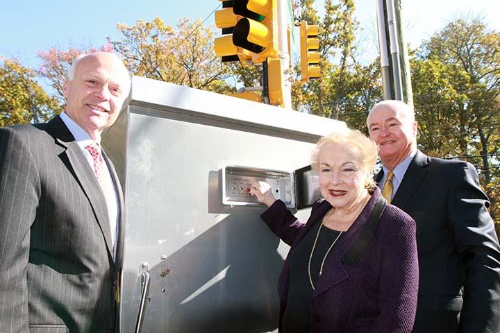 The traffic light on Hope Road at Corregidor Road was activated today by members of the Monmouth County Freeholder Board. Freeholders Rich, Burry and Curley activated the light and reviewed the road improvements that have been completed in anticipation of the soon-to-open CommVault facility at the former Fort Monmouth Charles Wood Area in Tinton Falls.