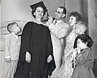 Bernice Eisenberg surrounded by her family on graduation day