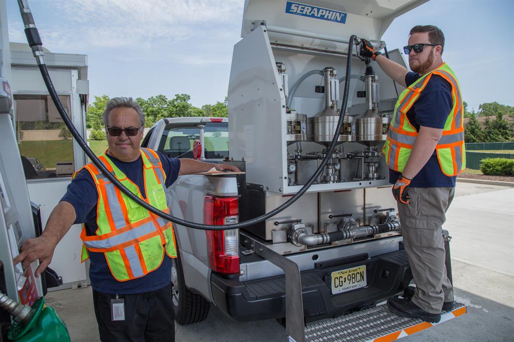 Monmouth County Weights & Measures staff testing gas pumps for accuracy.