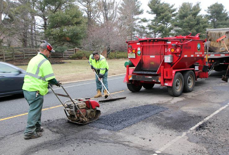 Specialized equipment seals the fill