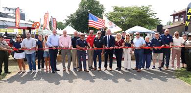 Elected Officials, Commissioner members and park staff in a group photo holding a ribbon Elected Officials, Commissioner members and park staff in a group photo holding a ribbon