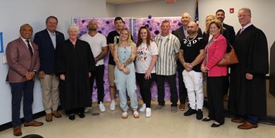 County Officials, County judges and graduates in a group photo
