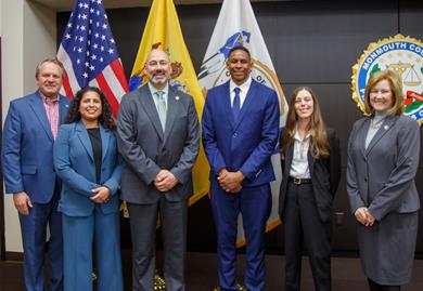 Commissioner Anderson, Commissioner Kiley, Prosecutor Santiago and those recently sworn in standing for a group photo Commissioner Anderson, Commissioner Kiley, Prosecutor Santiago and those recently sworn in standing for a group photo