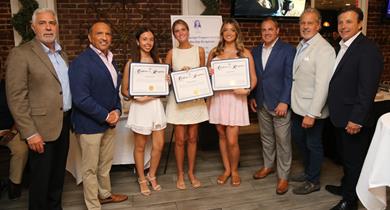 County Commissioners, Amerigo Vespucci members and scholarship recipients in a group photo