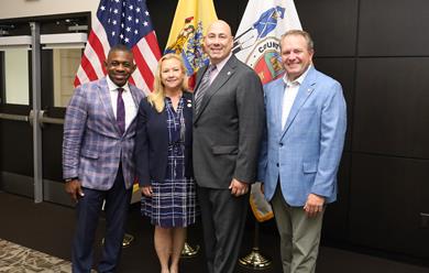 Pastor Akins, Surrogate Raisch, Prosecutor Santiago and Commissioner Anderson in a group photo